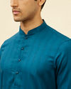 alt message - Manyavar Men Bright Blue Self Patterned Kurta Set image number 1